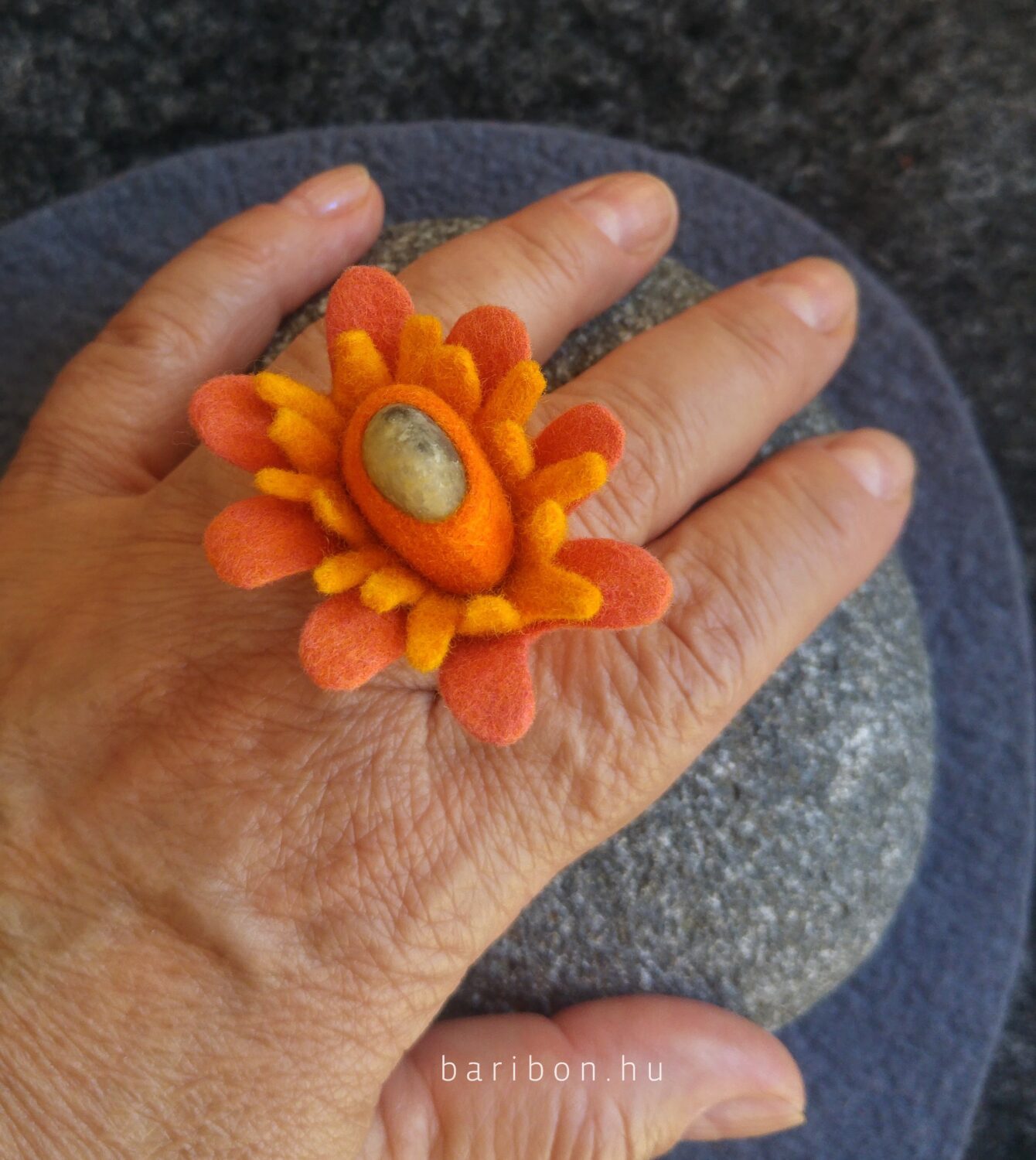 Flower shaped yellow and salmon pebble ring